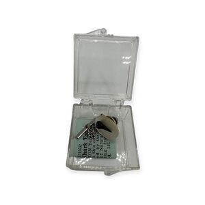 Genuine shark tooth cuff link in a clear box